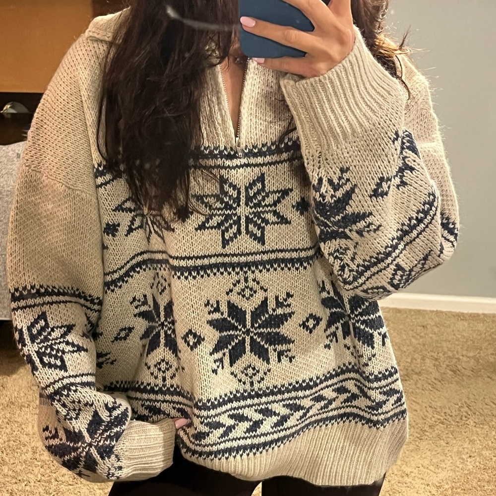 Elegant Cream and Black V-Neck Sweater